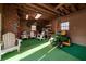 Inside of the outbuilding featuring chairs, a lawn mower, and shelving units at 5367 Boone Run, Hollywood, SC 29449