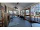 Covered screened porch with outdoor furniture and ceiling fan at 5367 Boone Run, Hollywood, SC 29449