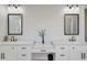 Beautiful bathroom with double sinks, sleek countertops, and stylish mirrors at 614 Cummings Chapel Rd, Ridgeville, SC 29472