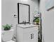 Stylish half bath features a granite countertop and decorative accents at 614 Cummings Chapel Rd, Ridgeville, SC 29472