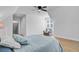 Spacious bedroom with a ceiling fan and a chair by the window to enjoy the natural light at 614 Cummings Chapel Rd, Ridgeville, SC 29472