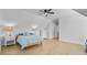 This spacious bedroom features a ceiling fan, hardwood floors, and white trim throughout the space at 614 Cummings Chapel Rd, Ridgeville, SC 29472