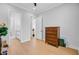 Bright bedroom with hardwood floors and a wooden dresser at 614 Cummings Chapel Rd, Ridgeville, SC 29472