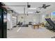 Spacious garage area with weight training equipment and a pool table at 614 Cummings Chapel Rd, Ridgeville, SC 29472