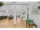 Bright, open living room featuring hardwood floors, fireplace, and stylish furnishings at 614 Cummings Chapel Rd, Ridgeville, SC 29472