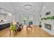 Open-concept living area with hardwood floors, fireplace, and access to the outdoor space at 614 Cummings Chapel Rd, Ridgeville, SC 29472