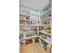 Walk-in pantry featuring ample shelving for optimal organization and storage of food and supplies at 614 Cummings Chapel Rd, Ridgeville, SC 29472