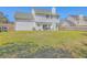 Spacious backyard with well-maintained lawn and patio area for outdoor dining at 628 Alwyn Blvd, Summerville, SC 29485