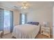 Comfortable bedroom featuring a white bed and views from the windows at 628 Alwyn Blvd, Summerville, SC 29485
