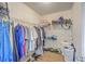 Walk-in closet featuring rows of hanging clothes and shelving for shoes and bags at 628 Alwyn Blvd, Summerville, SC 29485