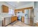 Charming kitchen with stainless steel appliances, granite countertops, and ample cabinet space at 628 Alwyn Blvd, Summerville, SC 29485