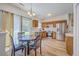 Eat in kitchen featuring a stainless steel refrigerator, wood cabinets, and backyard access at 628 Alwyn Blvd, Summerville, SC 29485