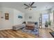 Inviting living room with wood-style floors, a comfortable sectional sofa, and stylish decor at 628 Alwyn Blvd, Summerville, SC 29485