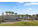 Attractive community entrance featuring lush landscaping and elegant signage at 663 Marsh Cove Cir, Summerville, SC 29486