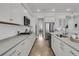 Spacious kitchen showcasing modern appliances and an open layout to the dining area at 663 Marsh Cove Cir, Summerville, SC 29486