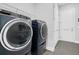 Well-equipped laundry room featuring modern washer and dryer units at 663 Marsh Cove Cir, Summerville, SC 29486