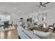 Open-concept living room with a view of the kitchen and dining area at 663 Marsh Cove Cir, Summerville, SC 29486