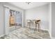 Dining nook with seating for two, open to the outside patio via sliding glass door at 7814 Nummie Ct, North Charleston, SC 29418