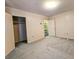 Spacious bedroom featuring wall paper, plush carpeting and multiple closets at 8524 Cane Branch Rd, Ruffin, SC 29475