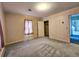 Standard bedroom featuring neutral wall paper, large window, and plush carpeting at 8524 Cane Branch Rd, Ruffin, SC 29475