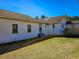 Back of house showing the yard and the access steps at 8524 Cane Branch Rd, Ruffin, SC 29475