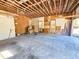 Unfinished garage interior, providing a blank canvas for customization and versatile use at 8524 Cane Branch Rd, Ruffin, SC 29475
