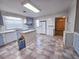 Bright kitchen showcases plenty of counter space, modern appliances, and a glimpse into other rooms at 8524 Cane Branch Rd, Ruffin, SC 29475