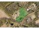 Aerial view of the property with 2.5 acres cleared for pasture with a pond at 10044 Randall Rd, McClellanville, SC 29458