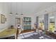 Spacious playroom with ample storage, lots of natural light, and a playful decor scheme at 10044 Randall Rd, McClellanville, SC 29458