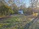 The backyard features a charming chicken coop ready for poultry enthusiasts at 10044 Randall Rd, McClellanville, SC 29458