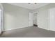 Bedroom features neutral carpeting, soft-colored walls, and white trim throughout at 1012 Rosewood Ln, Mount Pleasant, SC 29464