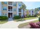 Image of condo building with palm tree and sidewalk at 1012 Rosewood Ln, Mount Pleasant, SC 29464