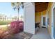 Image shows a landscaped exterior view from a ground-level patio at 1012 Rosewood Ln, Mount Pleasant, SC 29464