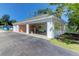 Community car wash station with covered bays, washing equipment, and refuse receptacles at 1012 Rosewood Ln, Mount Pleasant, SC 29464