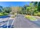 Community entrance featuring lush landscaping, signage, and secure gated access at 1012 Rosewood Ln, Mount Pleasant, SC 29464