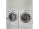 Functional laundry room with modern appliances for efficient and convenient chore management at 1012 Rosewood Ln, Mount Pleasant, SC 29464