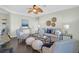 Cozy living room showcasing sophisticated decor and dark wood flooring for added warmth at 1012 Rosewood Ln, Mount Pleasant, SC 29464