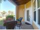Cozy covered patio featuring a seating area with comfortable chairs and views of the surrounding landscape at 1012 Rosewood Ln, Mount Pleasant, SC 29464