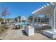 Image of outdoor community pool with nearby lounge and grilling area at 1012 Rosewood Ln, Mount Pleasant, SC 29464