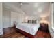 Spacious bedroom featuring a sloped ceiling, wood flooring, and ambient lighting at 108 Salthouse Ln, Kiawah Island, SC 29455