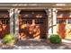 Garage with wooden doors and adjacent landscaping at 108 Salthouse Ln, Kiawah Island, SC 29455