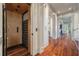 Hallway with hardwood floors showing an elevator at 108 Salthouse Ln, Kiawah Island, SC 29455