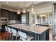 Bright kitchen with white countertops, stainless steel appliances, and a breakfast nook with views of the outdoors at 108 Salthouse Ln, Kiawah Island, SC 29455