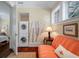 Functional laundry area with stacked washer/dryer units conveniently located off the sitting room at 108 Salthouse Ln, Kiawah Island, SC 29455