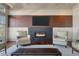 Bright, open living area features a fireplace, hardwood floors, and comfortable seating for entertaining at 108 Salthouse Ln, Kiawah Island, SC 29455
