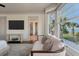 Cozy main bedroom showing sofa in bay window at 108 Salthouse Ln, Kiawah Island, SC 29455