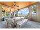 Outdoor patio offers comfortable seating, ceiling fans, and beautiful views of the water at 108 Salthouse Ln, Kiawah Island, SC 29455