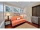 Relaxing sitting area with a cozy loveseat, soft lighting, and built-in beverage center at 108 Salthouse Ln, Kiawah Island, SC 29455
