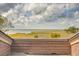 Waterfront view from the rooftop deck showcasing marshland and a cloudy sky at 108 Salthouse Ln, Kiawah Island, SC 29455