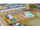 Beautiful aerial view of community amenities including the pool, playground, lake, common areas and neighborhood at 1081 Magnolia Warbler Way, Ravenel, SC 29470